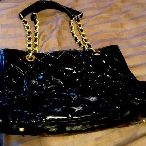 Paradox leather quilted Purse